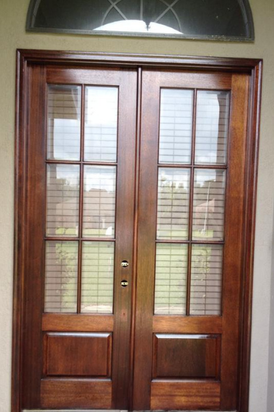 Antique Glass Front Door Refinished by Red Door Painting, LLC After